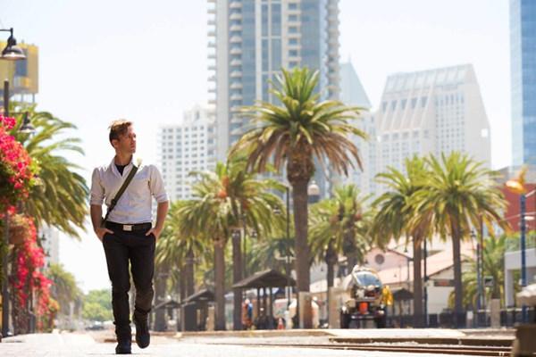 young professional walks in southern california